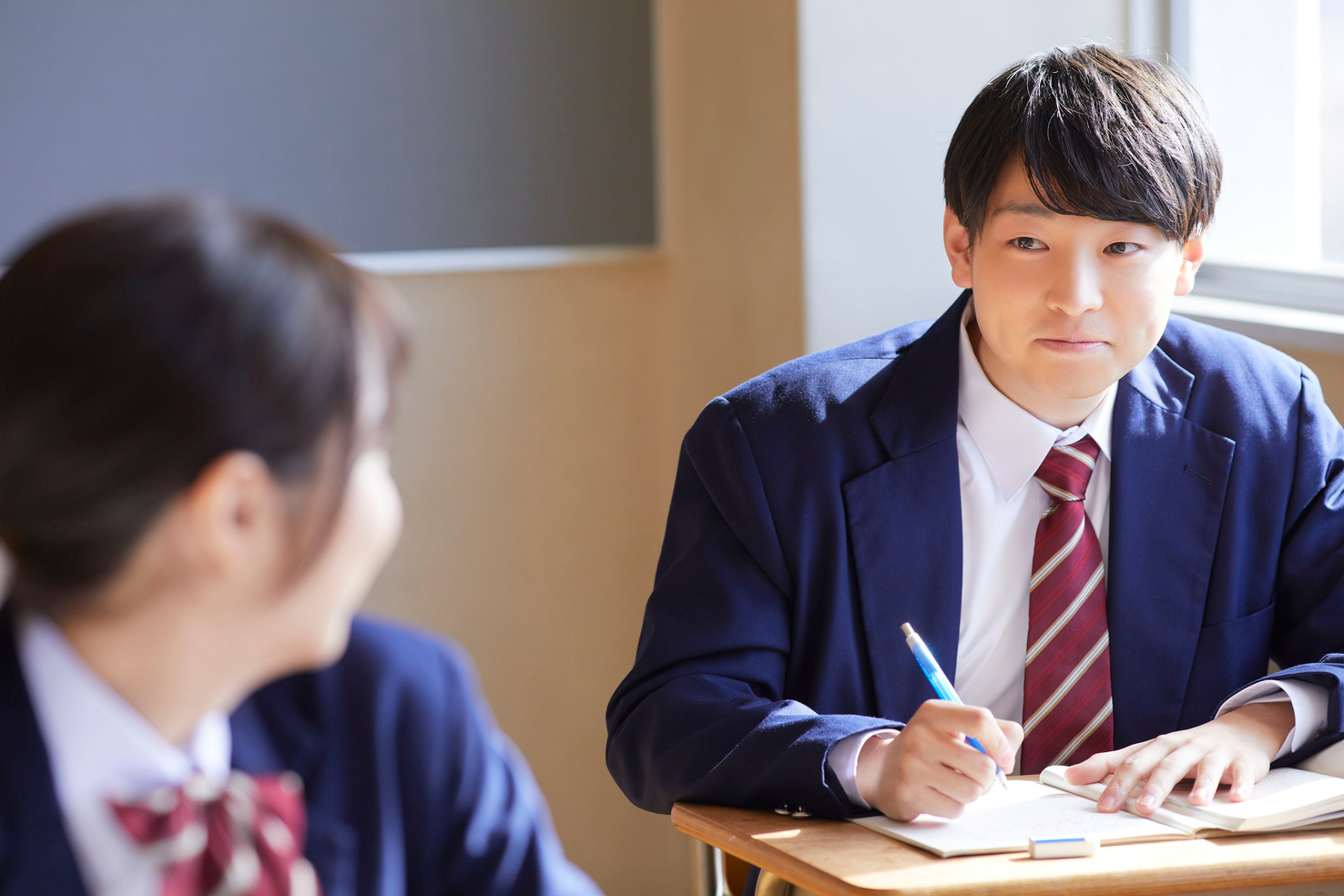 Japanese High School Student Engaged in Class Discussion